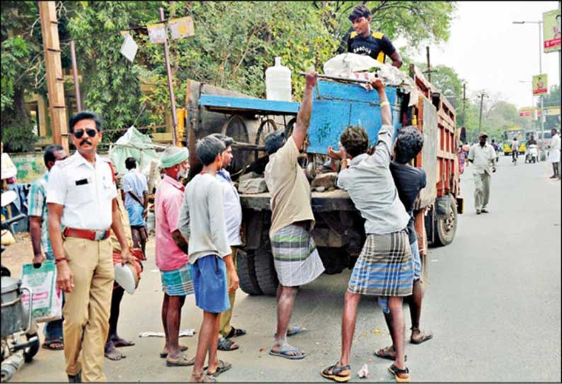 திண்டுக்கல் ஏ.எம்.சி.சாலையில் போலீஸ் பாதுகாப்புடன் ஆக்கிரமிப்புகள் அகற்றம்