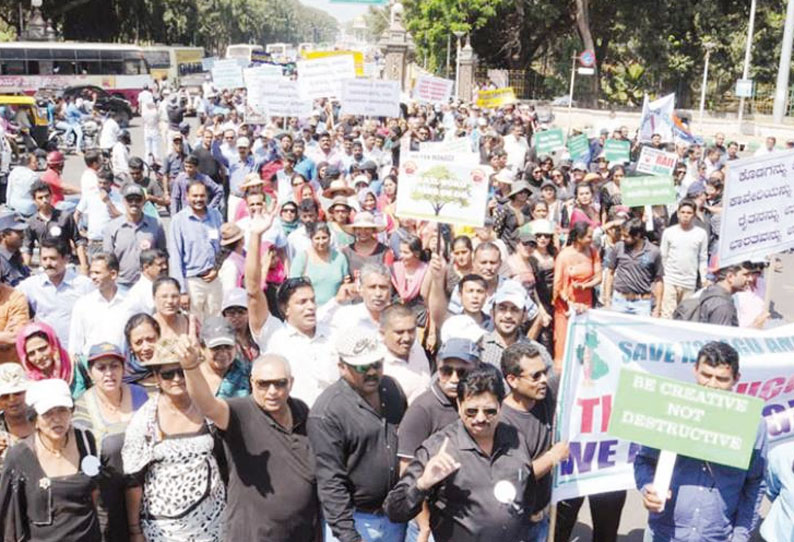 வனப்பகுதியில் மரங்களை வெட்டி ரெயில் பாதை அமைக்க எதிர்ப்பு: சுற்றுச்சூழல் ஆர்வலர்கள் போராட்டம்