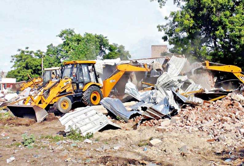 ராஜபாளையம் அருகே ஊருணியில் கட்டப்பட்ட 17 கடைகள் இடித்து அகற்றம்