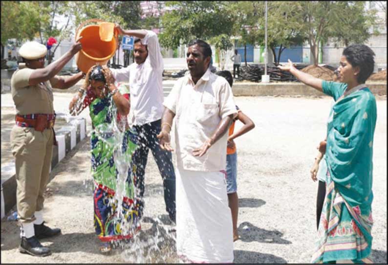 சேலம் மாவட்ட போலீஸ் சூப்பிரண்டு அலுவலகத்தில் பரபரப்பு ஒரே குடும்பத்தை சேர்ந்த 6 பேர் தீக்குளிக்க முயற்சி