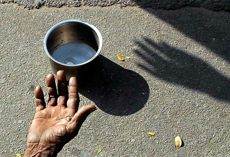 கிண்டி ரெயில் நிலையம் அருகே பார்வையற்ற பிச்சைக்காரரிடம் பணம் பறிப்பு