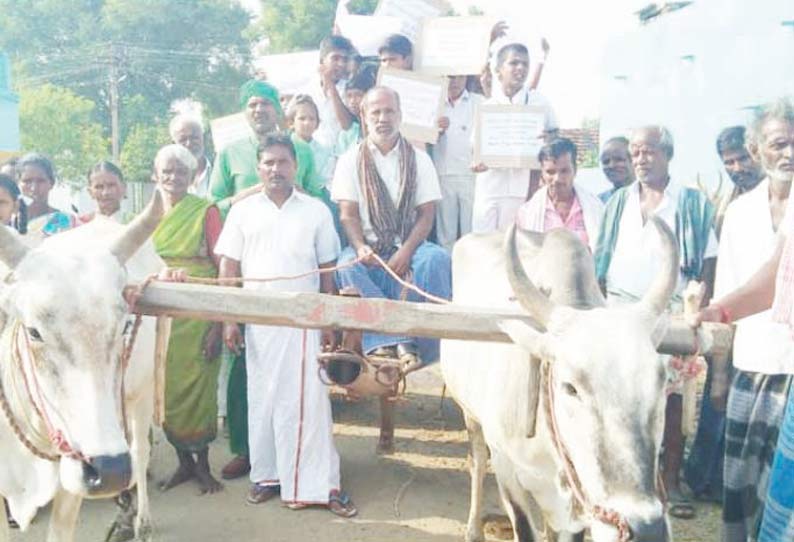 கூடுதல் பஸ் இயக்கக்கோரி மாணவர்களை மாட்டு வண்டியில் ஏற்றி நூதன போராட்டம்