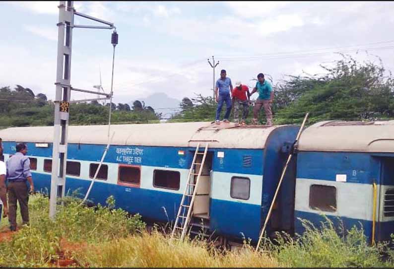 ஆரல்வாய்மொழி அருகே பரபரப்பு; மும்பை எக்ஸ்பிரஸ் மீது உயர் அழுத்த மின்கம்பி அறுந்து விழுந்தது - அதிர்ஷ்டவசமாக பயணிகள் உயிர் தப்பினர்