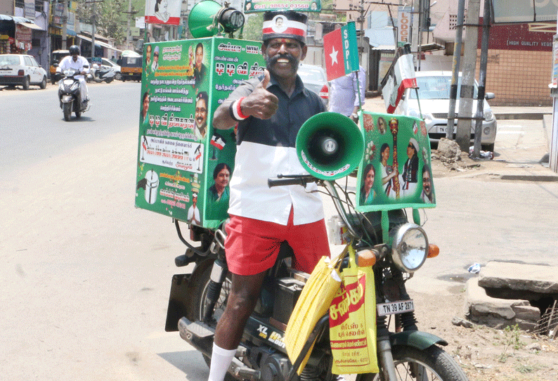 சின்னம் ஒதுக்கப்படாத நிலையில் குக்கருக்கு வாக்கு சேகரிக்கும் அ.ம.மு.க. தொண்டர்