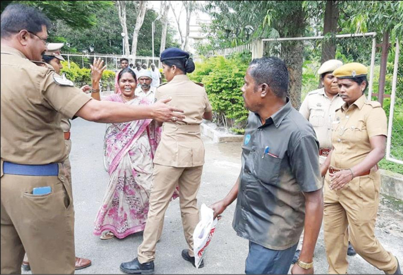 தர்மபுரி கலெக்டர் அலுவலக வளாகத்தில் தீக்குளிக்க முயன்ற தம்பதியால் பரபரப்பு