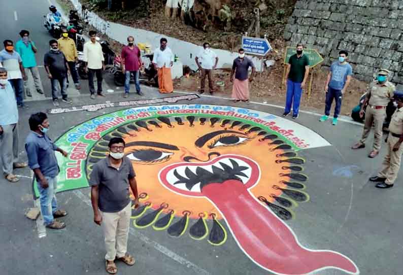 கொரோனா வைரஸ் பரவலை தடுக்க சாலைகளில் ஓவியம் வரைந்து விழிப்புணர்வு ஏற்படுத்தும் அதிகாரிகள்