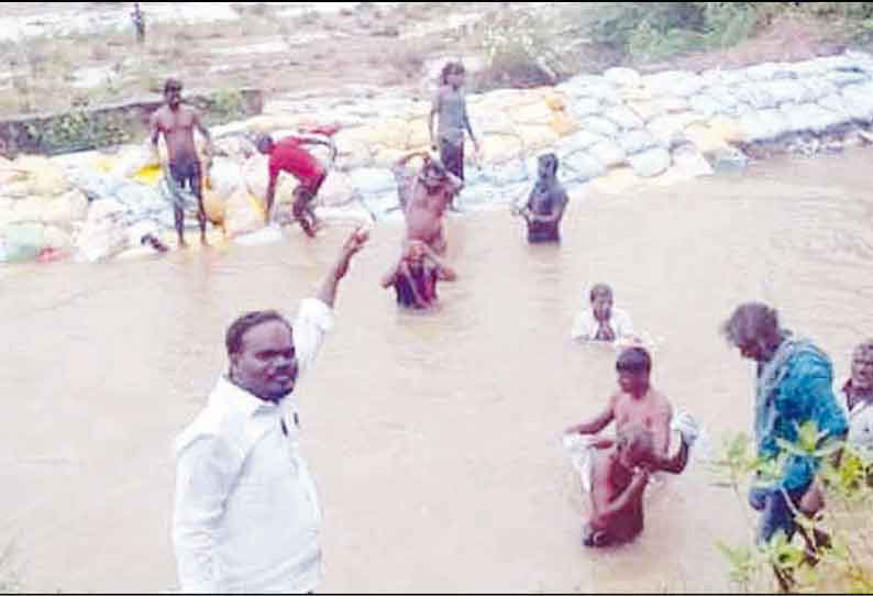 அத்தியூர் ஏரிக்கு தண்ணீர் செல்லும் வாய்க்கால் கரை உடைப்பு தடுப்புச்சுவர் அமைக்க கோரிக்கை