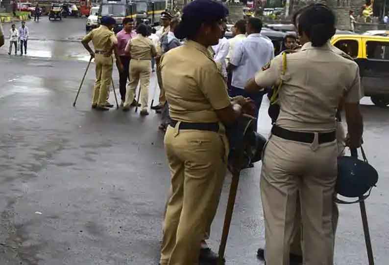 கணவர் எனக் கூறி ரகசிய காதலனை கொரோனா தடுப்பு முகாமில் தன்னுடன் தங்க வைத்து கொண்ட பெண் போலீஸ்