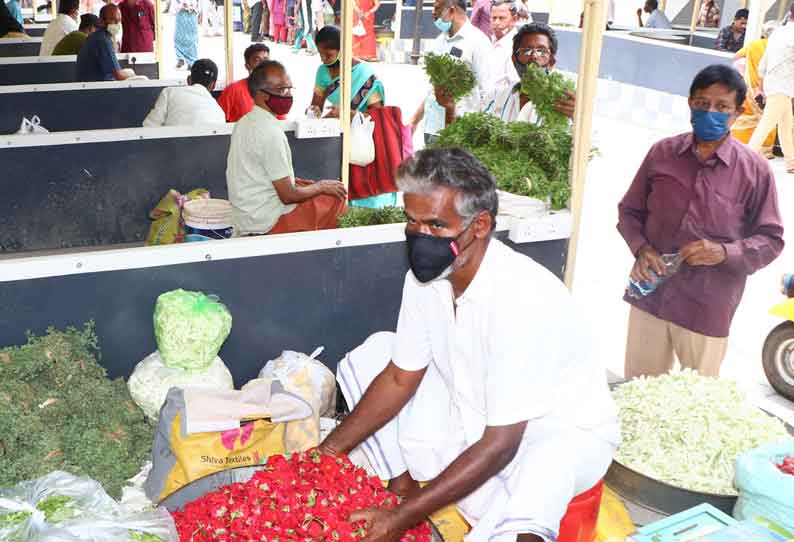 புதிய பூ மார்க்கெட்டில் கடைகள் தற்காலிகமாக திறப்பு