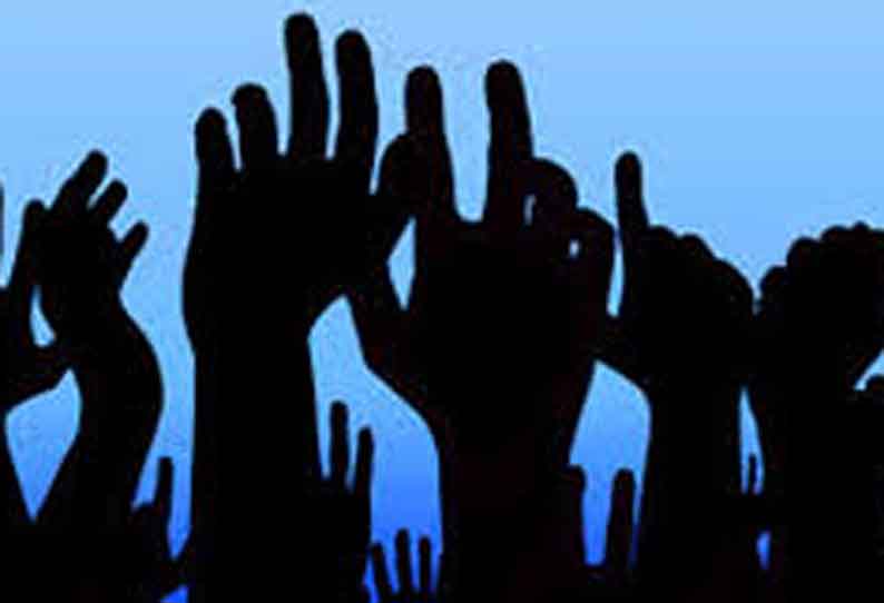 கப்பலூர் சுங்கச்சாவடி அலுவலகத்திற்கு கட்டிடம் கட்டுவதை கண்டித்து போராட்டம்