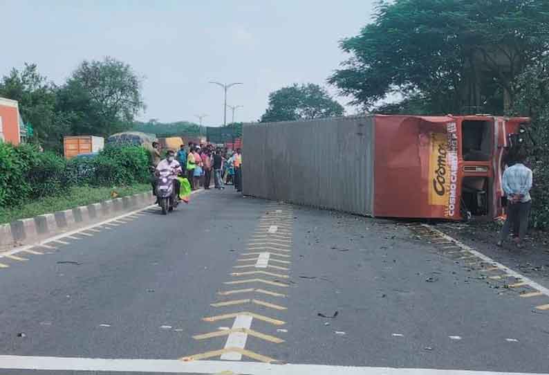 தொப்பூர் கணவாயில் கன்டெய்னர் லாரி கவிழ்ந்து போக்குவரத்து பாதிப்பு