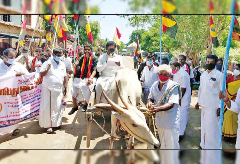 பெட்ரோல், டீசல் விலையை குறைக்கக்கோரி மாட்டு வண்டியில் ஊர்வலமாக சென்று ஆர்ப்பாட்டம்