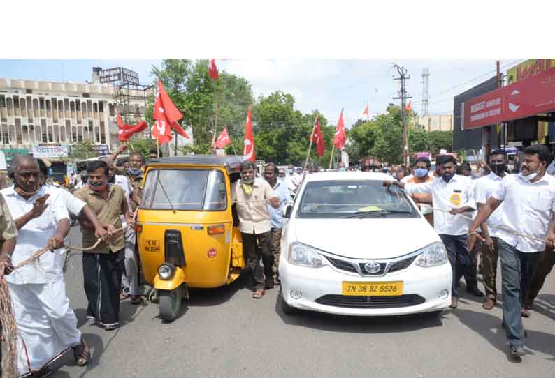 காரை கயிறு கட்டி இழுத்து நூதன ஆர்ப்பாட்டம்