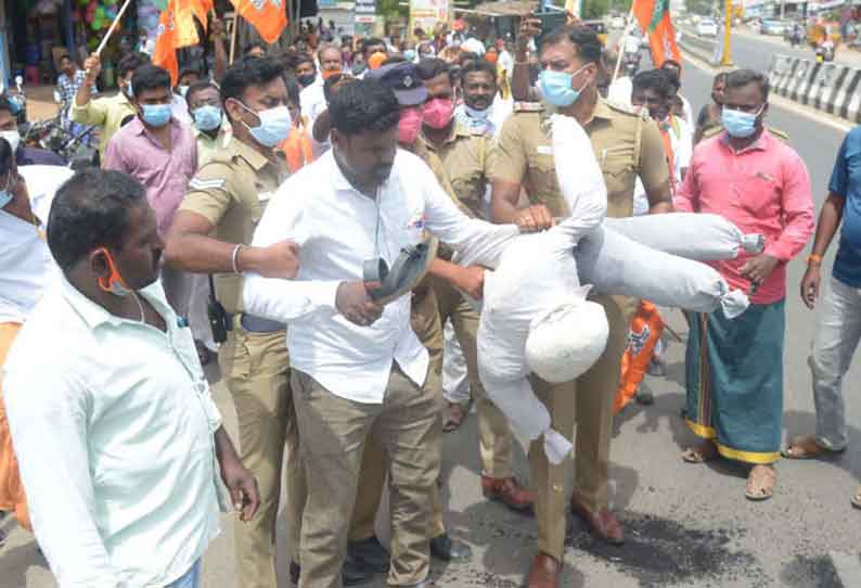 ஈஸ்வரன் எம்.எல்.ஏ. உருவ பொம்மையை பா.ஜனதாவினர் எரிக்க முயற்சி