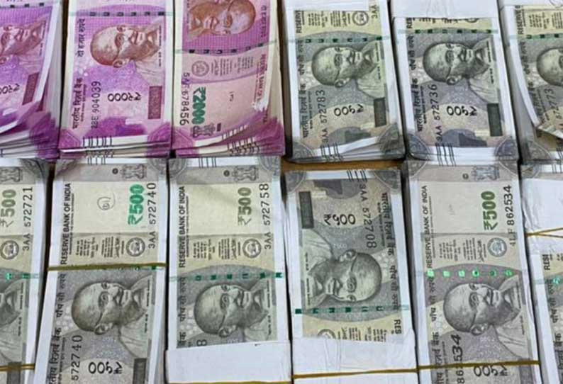 போலி மதுபான தொழிற்சாலையில் ரூ.14 லட்சம் கள்ளநோட்டுகள் சிக்கியது; பெண் உள்பட 2 பேர் கைது