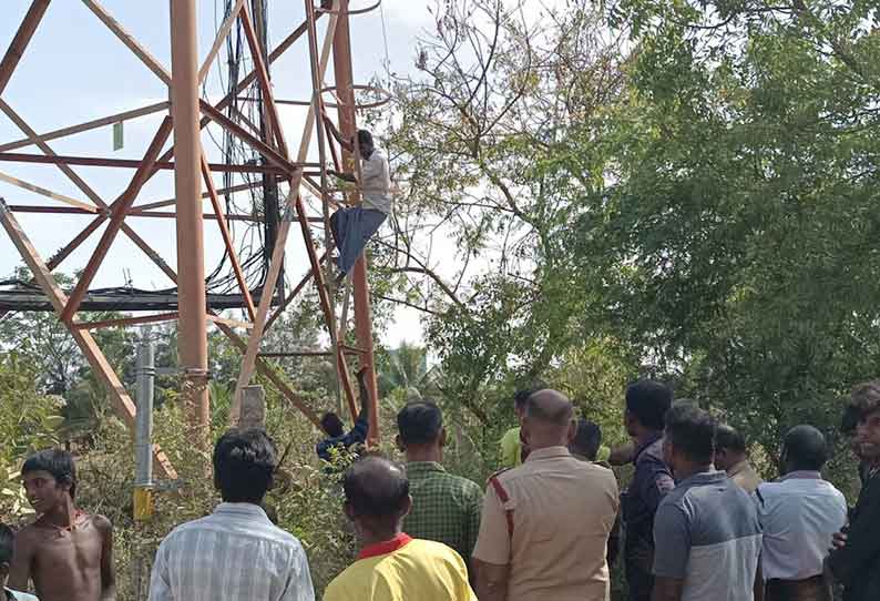 செல்போன் கோபுரத்தில் ஏறி தற்கொலை மிரட்டல் விடுத்த தொழிலாளி