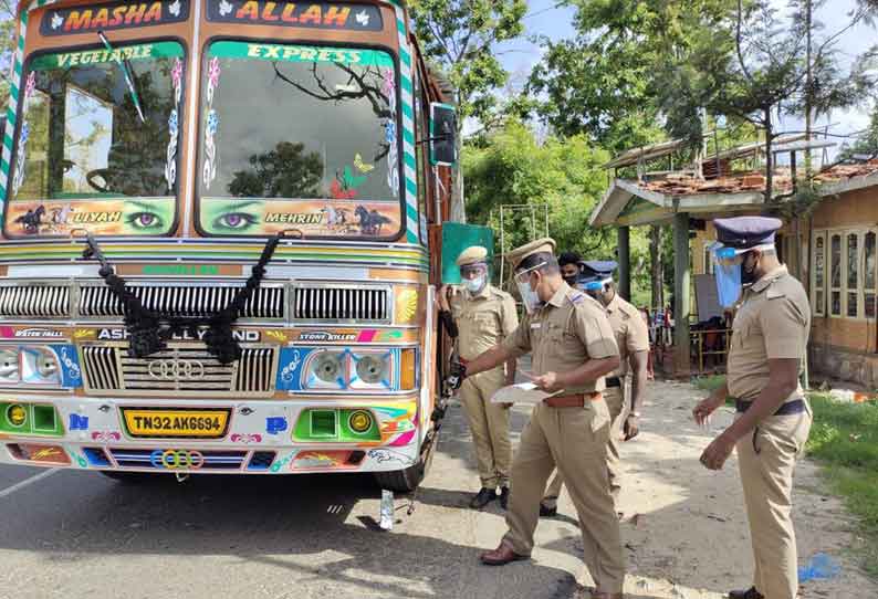 சரக்கு லாரிகளை தொடாமல் கண்ணாடியால் சோதனை