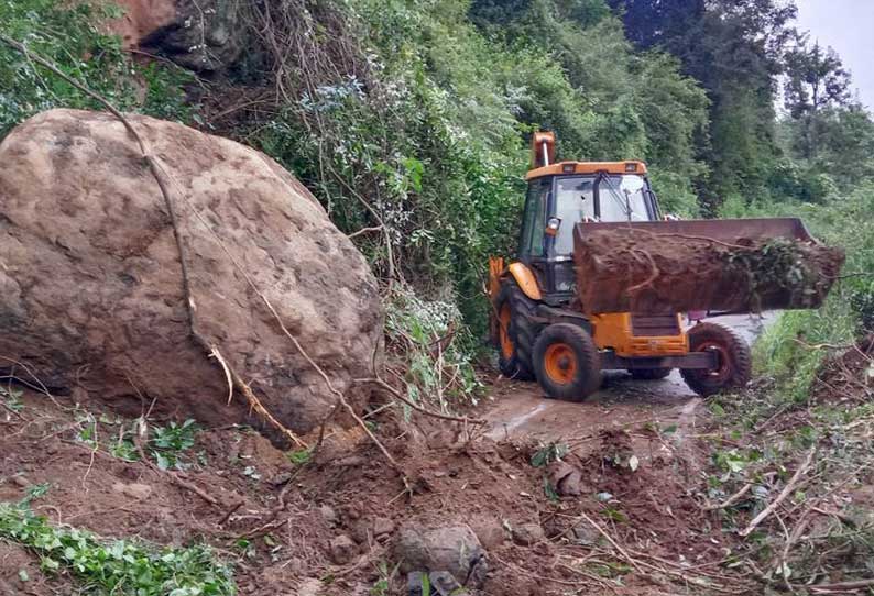 மலைப்பாதையில் உருண்டு விழுந்த பாறைகள்