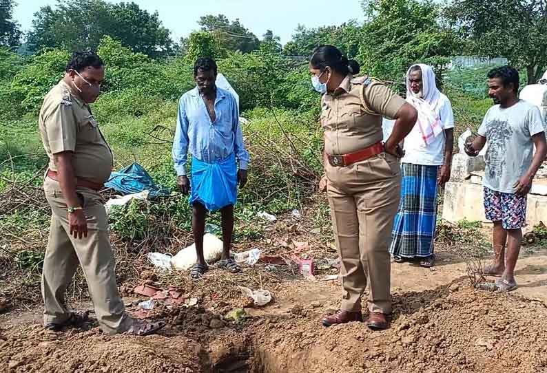 ஜோலார்பேட்டை அருகே பெண்ணின் பிணத்தை தோண்டி கழுத்தை அறுத்த மர்ம நபர்கள்