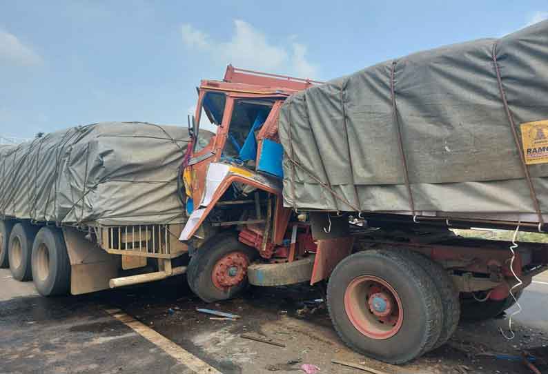 லாரிகள் மோதல்; டிரைவர் படுகாயம்