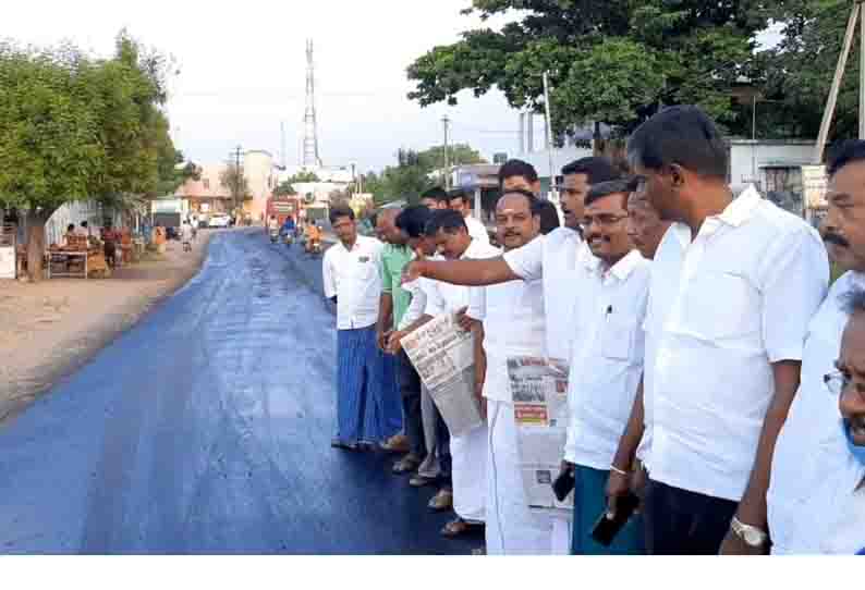 தார் சாலை அமைக்கும் இடத்தில் அ.தி.மு.க.வினர் திரண்டதால் பரபரப்பு