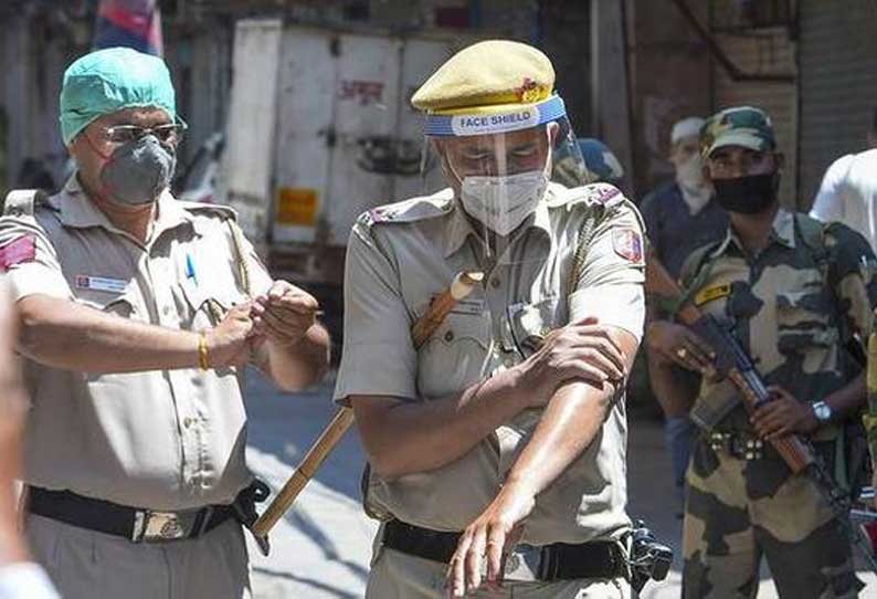 டெல்லியில் கூடுதல் ஆணையர் உள்பட ஆயிரம் போலீசாருக்கு கொரோனா