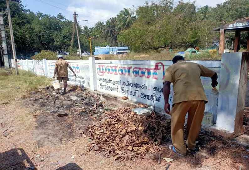 நெகமம் பேரூராட்சியில் சுவர் விளம்பரம் அகற்றம்