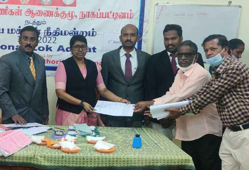 தேசிய மக்கள் நீதிமன்றத்தில் 8,422 வழக்குகளுக்கு தீர்வு