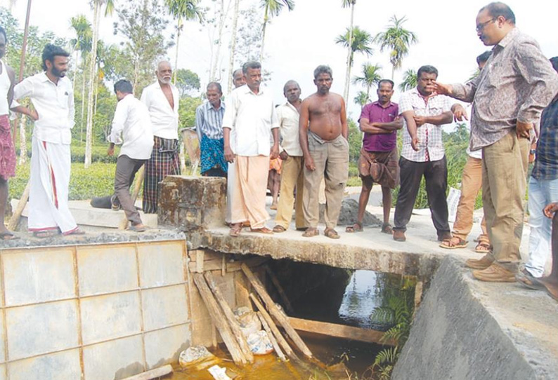 நெல்லியாளம் நகராட்சியில் பாலம் சீரமைப்பு பணியை தடுத்து நிறுத்திய பொதுமக்கள்